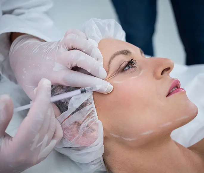 Woman getting Botox® injections